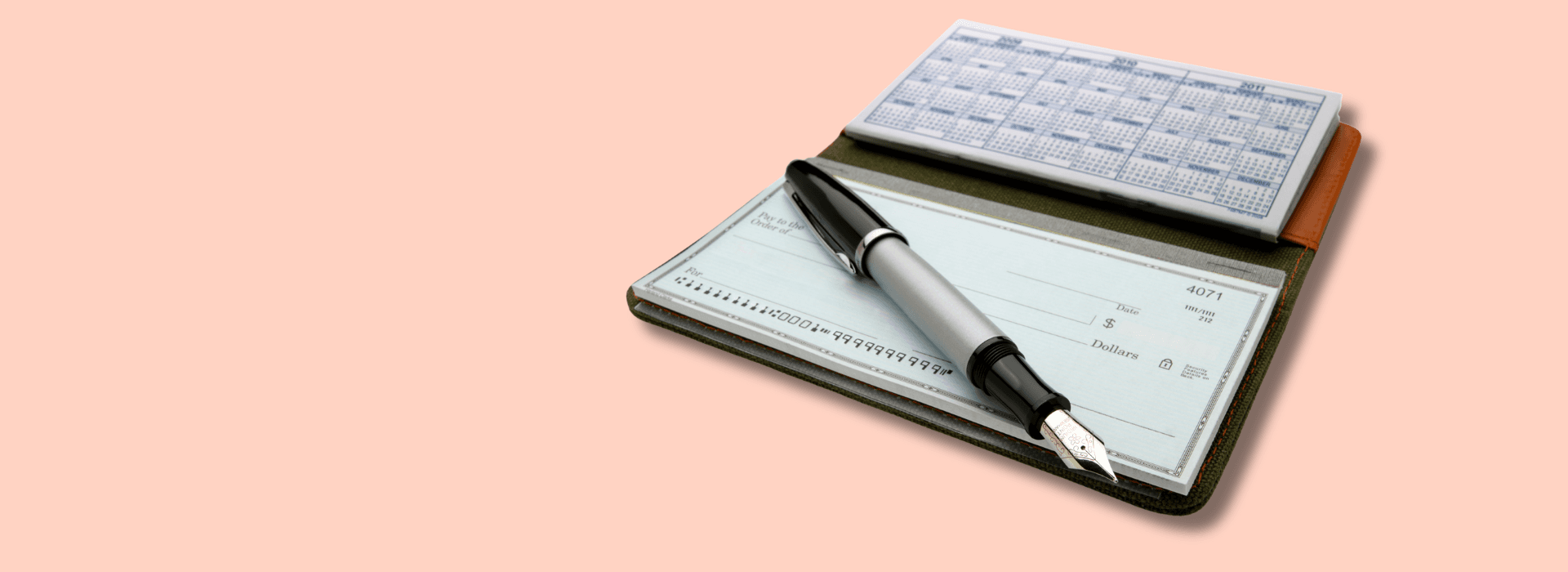 A checkbook and pen