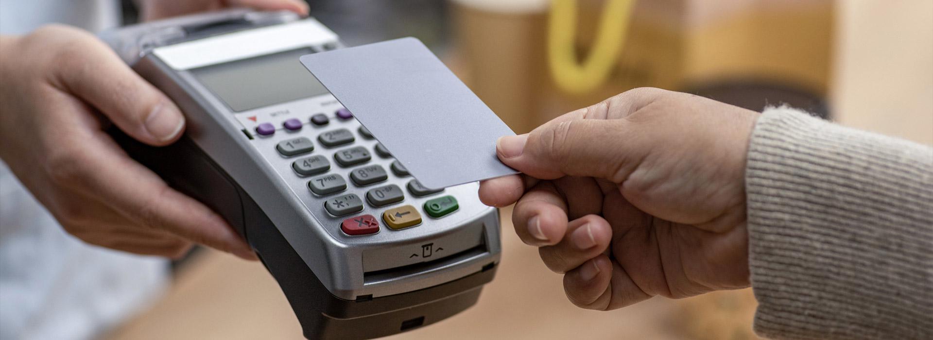 Credit card being held over processor